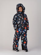 Luxury kids’ snowsuit with cosmic space print featuring rockets and planets, waterproof and breathable, Sorona® eco insulation, Oeko-Tex certified, handcrafted in Europe for warmth to −25°C.