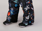 Luxury kids’ snowsuit with cosmic space print featuring rockets and planets, waterproof and breathable, Sorona® eco insulation, Oeko-Tex certified, handcrafted in Europe for warmth to −25°C.