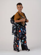 Luxury kids’ snowsuit with cosmic space print featuring rockets and planets, waterproof and breathable, Sorona® eco insulation, Oeko-Tex certified, handcrafted in Europe for warmth to −25°C.
